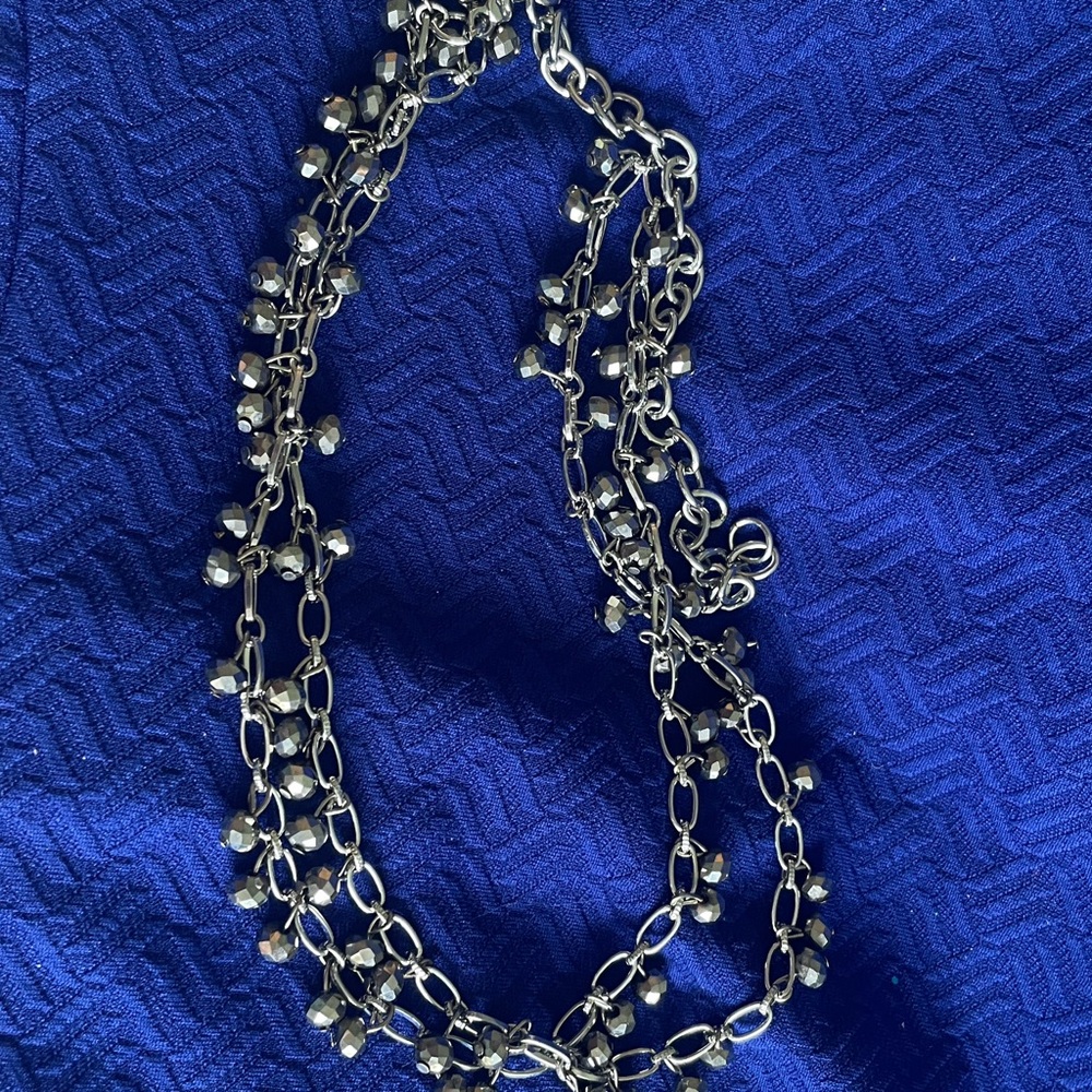 Marlyn Schiff faceted mirrored beads in a paper clip link design